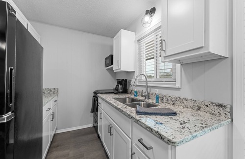 Indian Point Condo | Come stay at this modern 2 bedroom suite, located close to Table Rock Lake and Silver Dollar City!
