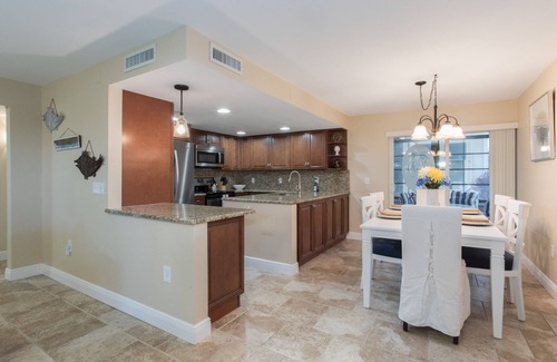 Madeira Beach Condo | Come to your HAPPY PLACE! 2/2 ground floor waterfront community Condo!
