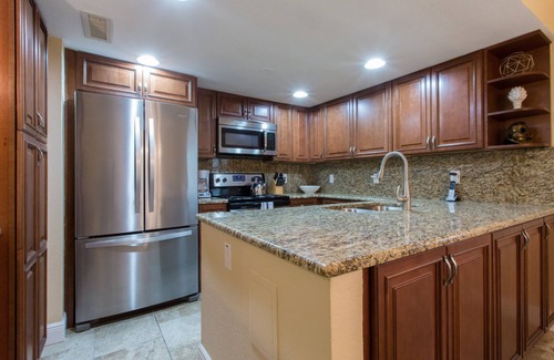Madeira Beach Condo | Come to your HAPPY PLACE! 2/2 ground floor waterfront community Condo!