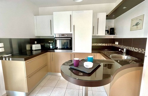 Erdeven Apartment | Comfortable 1-Bed Apartment in Quiet Residence with Balconies and Parking
