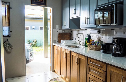 Tacarigua House | Comfortable 3-bedroom house AC TV in rooms WiFi laundry fully equipped kitchen