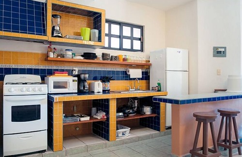Puerto Morelos Apartment | Comfortable apartment, well equipped kitchen next to sparkling pool