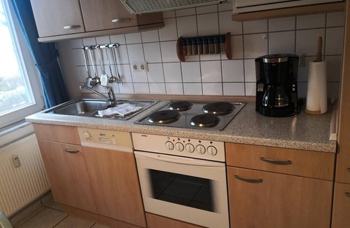 Stolpe auf Usedom Apartment | Comfortable country house on the lagoon in Stolpe with balcony and garden view - The
