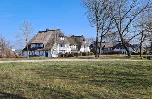 Stolpe auf Usedom Apartment | Comfortable country house on the lagoon in Stolpe with balcony and garden view - The