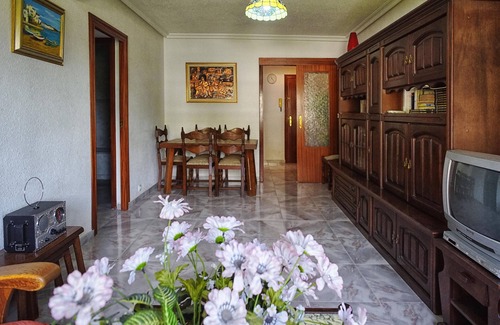 Alicante Apartment | Comfortable conditioned apartment with three dormitories sorrounded by gardens.
