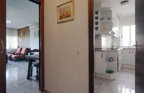 Alicante Apartment | Comfortable conditioned apartment with three dormitories sorrounded by gardens.