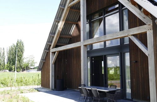 Veessen House | Comfortable farmhouse lodge for 8 people with a living kitchen and a pellet fireplace