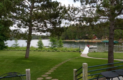 Park Rapids House | Comfortable home with amazing porch located on Big Sand Lake & Pine Cone Lodge