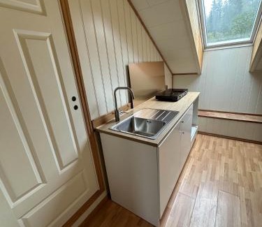 Osoyro House | Comfortable single room - double bed - private bathroom - Free parking - Shared kitchen - Bus stop and store 2 min walk
