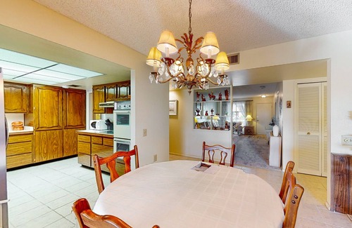 Sun City House | Comfortable stay with a pool, tennis court, and gym access, washer/dryer, & AC