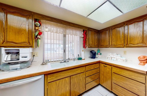 Sun City House | Comfortable stay with a pool, tennis court, and gym access, washer/dryer, & AC