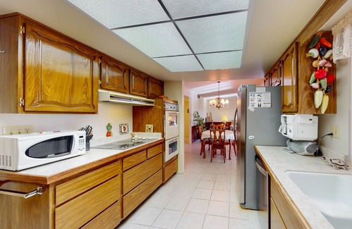 Sun City House | Comfortable stay with a pool, tennis court, and gym access, washer/dryer, & AC