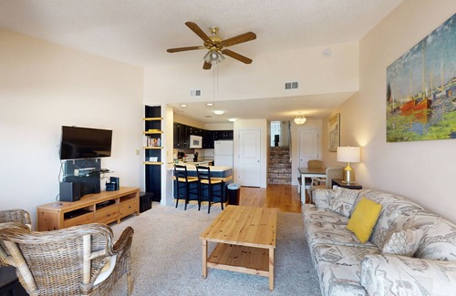 East End House | Comfortable townhome steps from beach with pool access, balcony, & W/D