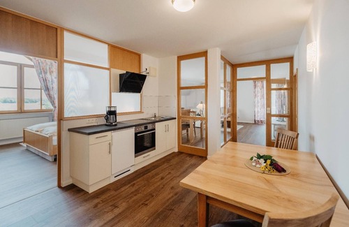 Bad Fuessing Apartment | Comfortably furnished suite (approx. 110 sqm) with kitchenette and balcony