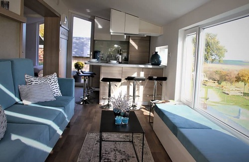 Municipality of Gulpen-Wittem Ski Chalet | Comfy chalet with cooking island in Limburg