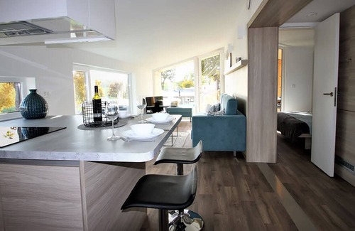 Municipality of Gulpen-Wittem Ski Chalet | Comfy chalet with cooking island in Limburg