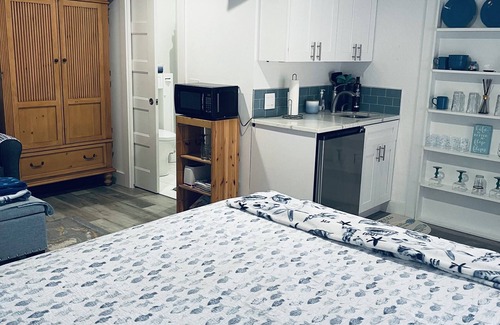 Bay Acres House | COMFY COZY PLACE. Open room with kitchenette. Close to beaches with 3 miles