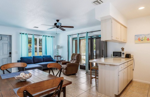 Grove City Apartment | Comfy home near beach with WiFi, W/D, AC, pool, grill, & ping-pong - dogs OK