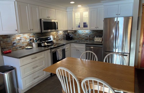 Carrabassett Valley Apartment | Comfy ski-in and out Sugarloaf 2-bedroom condo with access to pool house