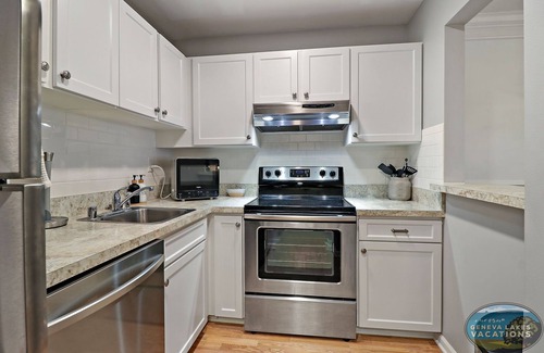 Lake Geneva Condo | Comotose by the Lake- Beautiful condo with pool- Easy walk to lake!
