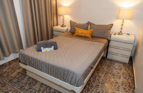 Bucana Apartment | Compact Haven with Private Entrance and FREE Parking and Laundry