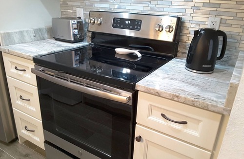 Madeira Beach Condo | Completely Remodeled, 1 BDRM Condo, heated pools, 2 min walk to the beach