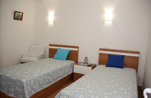 Almeida Condo | Conceição's Room