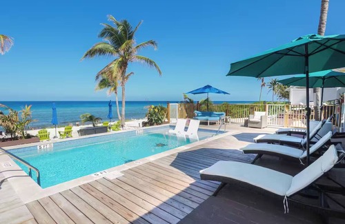 West Bay House | Conch Point 223 by the Sea : Grand Cayman Villa, steps to Private Beach and Pool