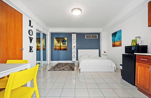 Puerta de Tierra Apartment | Condado | Balcony With Beach & Sunset Views | Pool