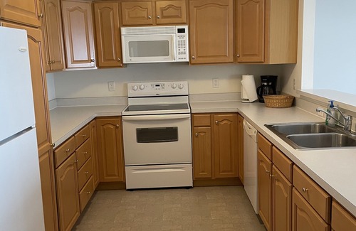 Port Austin Condo | Condo #5 Upper level condo with lovely Lake Huron sunset views .