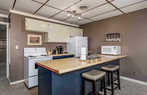 Pella Apartment | Condo in Pella- Steps to Shops, Bakeries, and Iconic Windmill!