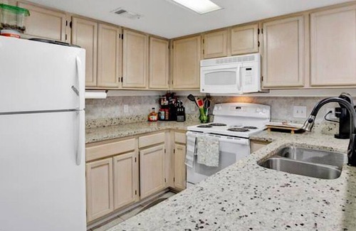 Gulf Shores Condo | Condo on mobile bay with boat lift and trailer parking
