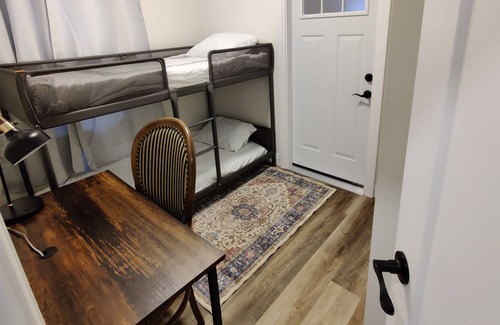 Brantford House | Condo style 2 bed unit on main level with parking