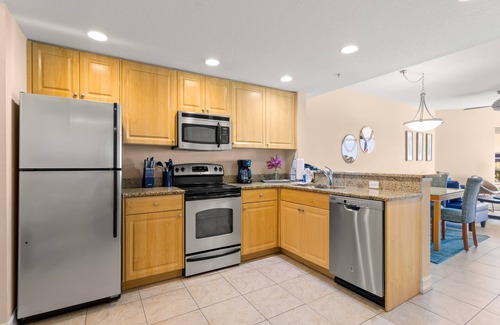 Capri Isle Condo | Condo with Balcony- Pool, Hot Tub Access + Short Walk to Beach!