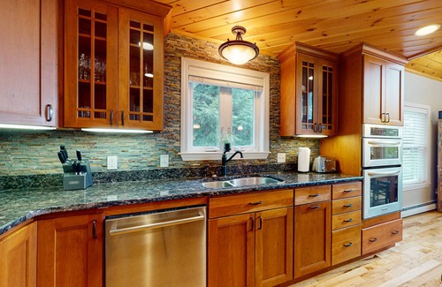 Windham House | Contemporary lake escape with hot tub, swim dock, firepit, & Ping-Pong