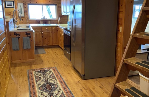 Isle House | Convienant location. Right on water. Private boat launch. Outdoor sauna!