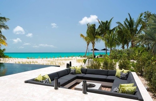 Leeward Settlement Villa | Cool beachfront fully staffed villa with unique architecture