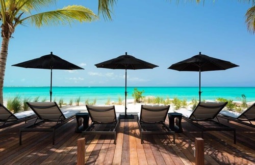 Leeward Settlement Villa | Cool beachfront fully staffed villa with unique architecture