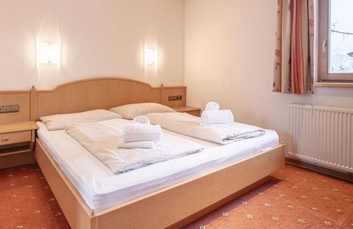 Reith bei Kitzbuehel Apartment | Cosy apartment for 5 guests with WIFI, hot tub, TV, balcony, pets allowed and parking