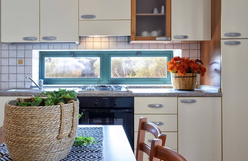 Trinita d'Agultu Apartment | Cosy apartment for 4 guests with pool, WIFI, A/C, TV, patio and parking