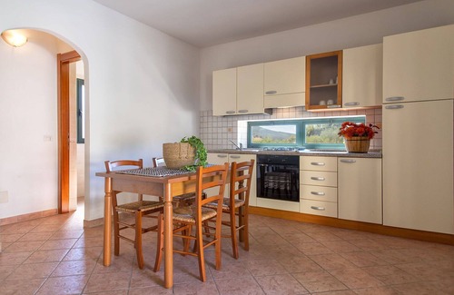 Trinita d'Agultu Apartment | Cosy apartment for 4 guests with pool, WIFI, A/C, TV, patio and parking