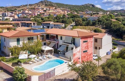 Trinita d'Agultu Apartment | Cosy apartment for 4 guests with pool, WIFI, A/C, TV, patio and parking