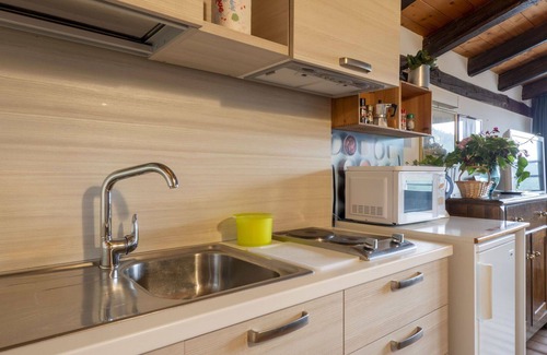 Vito d'Asio Apartment | Cosy apartment for 2 guests with pool, WIFI, A/C, TV, patio, pets allowed and parking