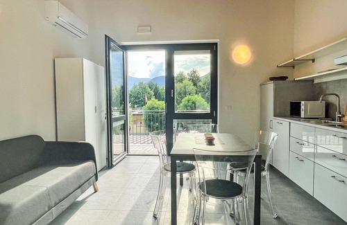 Dervio Apartment | Cosy apartment for 4 guests with A/C, WIFI, pool, TV, patio, panoramic view and parking