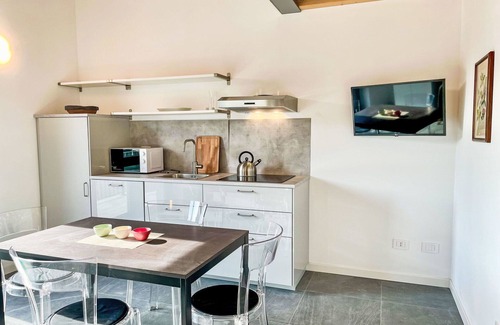 Dervio Apartment | Cosy apartment for 4 guests with A/C, WIFI, pool, TV, patio, panoramic view and parking