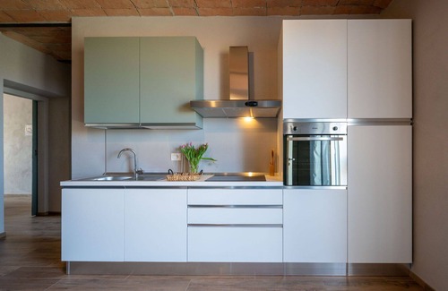 Calosso Apartment | Cosy apartment for 4 people with pool, WIFI, TV and balcony