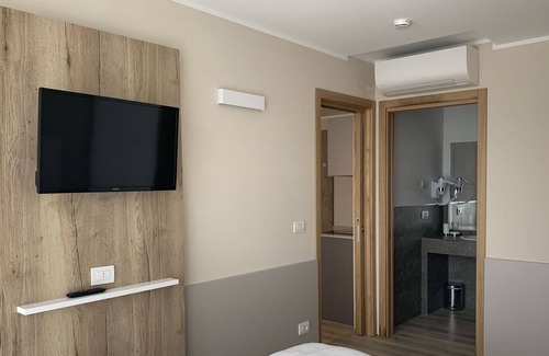 Corno Apartment | Cosy apartment for 4 people with WIFI, pool, A/C, TV, patio and parking