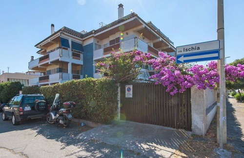 Torvaianica Apartment | Cosy apartment for 4 guests with WIFI, TV, terrace and parking