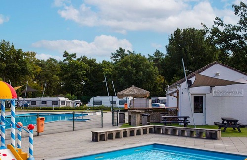Soerendonk House | Cosy apartment in villa for 4 guests with pool, TV, terrace, pets allowed and parking