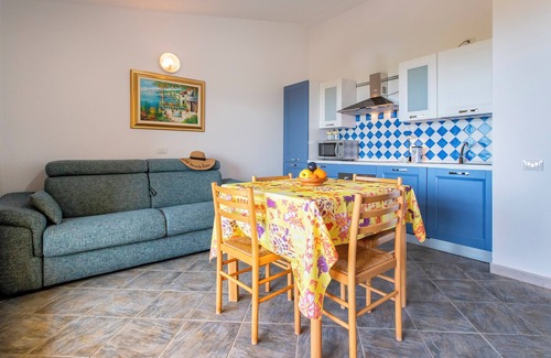 Trinita d'Agultu Apartment | Cosy Holiday Apartment “Con Piscina 13” with Sea View, Garden & Pool